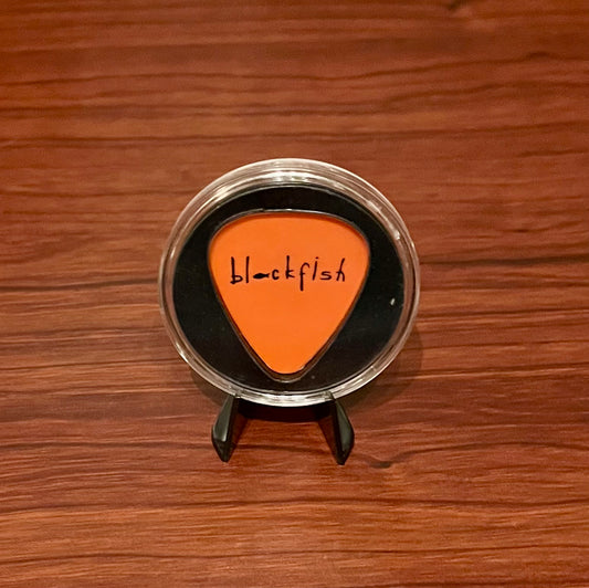 Guitar pick in mini display (Orange)